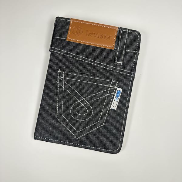 Y a-t-il des inconvénients à utiliser du tissu denim pour des couvertures de cahier personnalisées ?